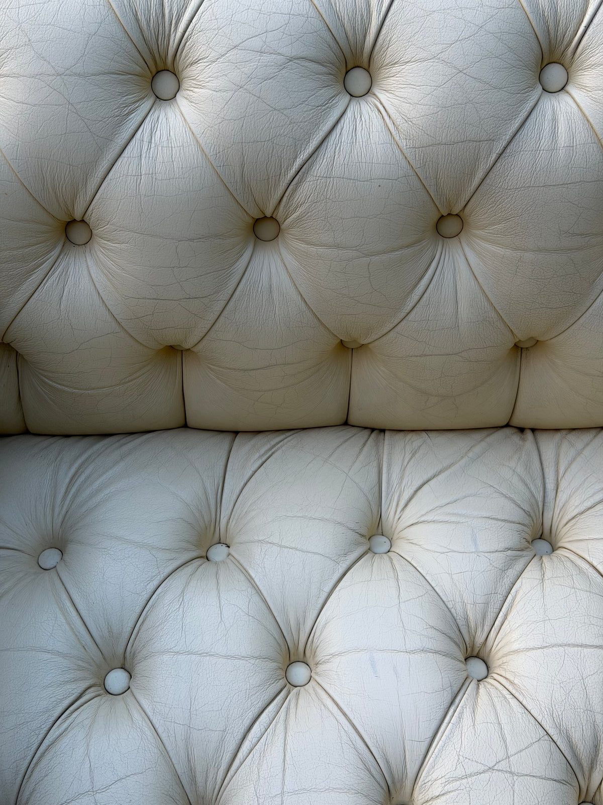 Cream Tufted Vinyl Chesterfield Sofa