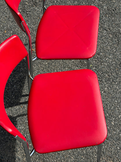 Pair of Stendig Inc. Chrome & Red Stacking Chairs
