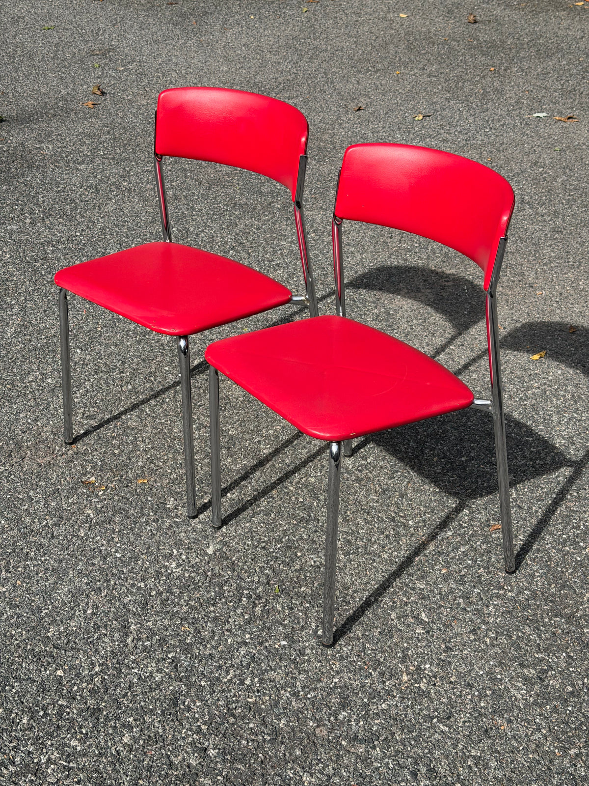 Pair of Stendig Inc. Chrome & Red Stacking Chairs