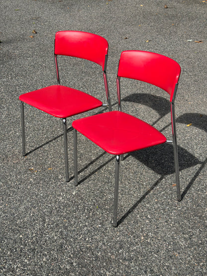 Pair of Stendig Inc. Chrome & Red Stacking Chairs