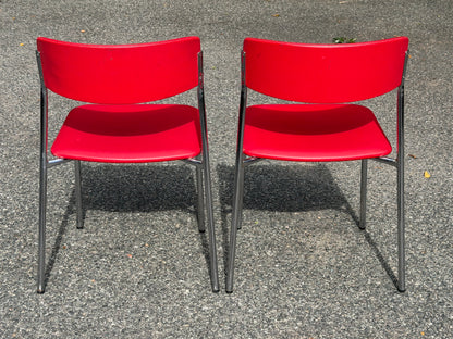 Pair of Stendig Inc. Chrome & Red Stacking Chairs